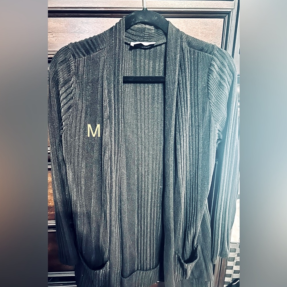 Flat black over the butt cardigan